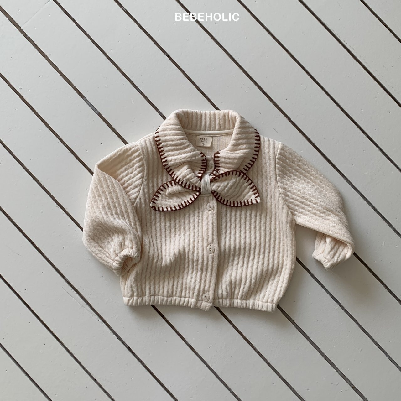 cream カーディガン